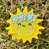 Sun shaped car freshie with hook and string hanging for fresh long lasting scent.