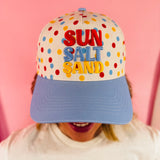 White polka dot hat with blue bill and colorful Sun Salt Sand embroidery.