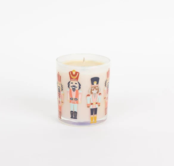 Sweet Grace Nutcracker candle in an iridescent glass jar with festive nutcracker decals.
