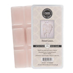 Sweet Grace wax bar with signature passion fruit and patchouli fragrance.