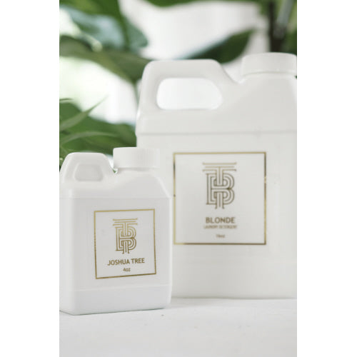 Thomas Blonde - 32oz bottle of Thomas Blonde Laundry Detergent.