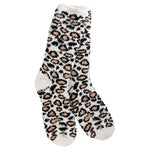 A pair of plush, soft crew socks featuring a classic all-over leopard print pattern in brown and black tones.