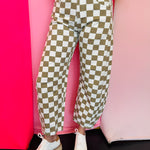 Tan and white checkered barrel jeans with high waist and front pockets.