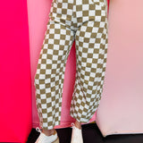 Tan and white checkered barrel jeans with high waist and front pockets.