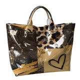Taupe leopard color block PVC tote bag with heart graphic.