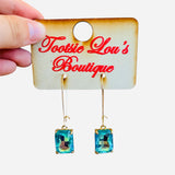 Teal Drop Earrings with gold-tone hooks and iridescent rectangular teal/blue gemstones