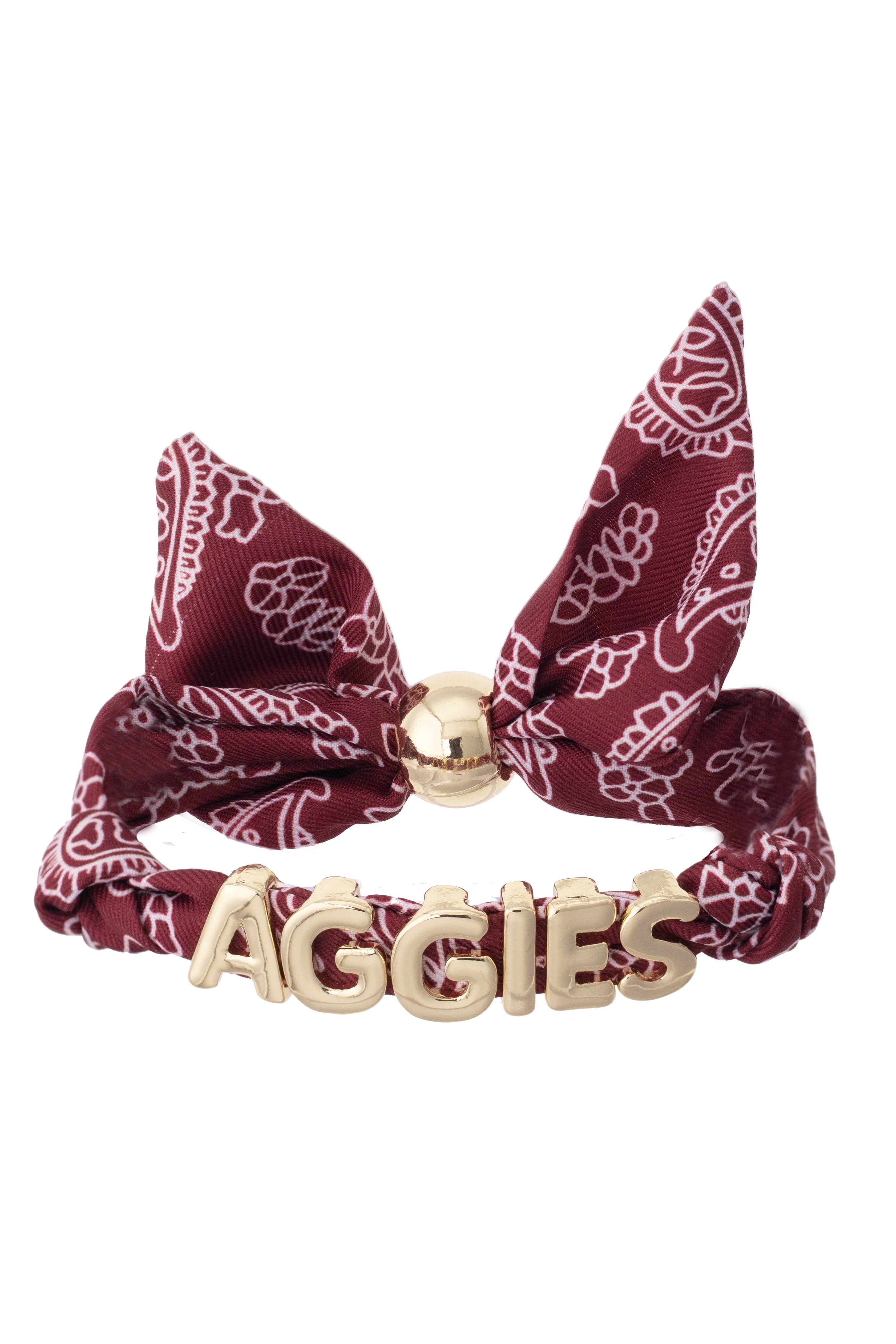Texas A&M bandana slider bracelet with gold AGGIES letter charms and adjustable fabric band.