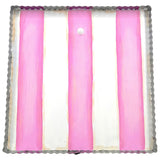 Pink and white striped metal display board for photos, notes, and cards.