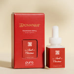 Pura The Smell of Christmas fragrance refill bottle.