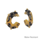 Water resistant tortoise acrylic earrings with gold ball accents.
