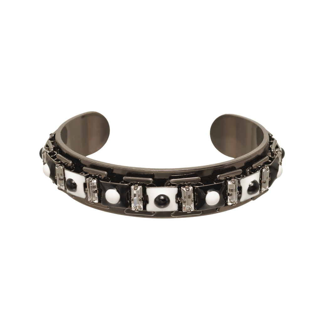 Black and white enamel cuff with baguette crystals and polished bead details.