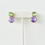 Tova violet crystal earrings with a brass base and sparkling statement design.