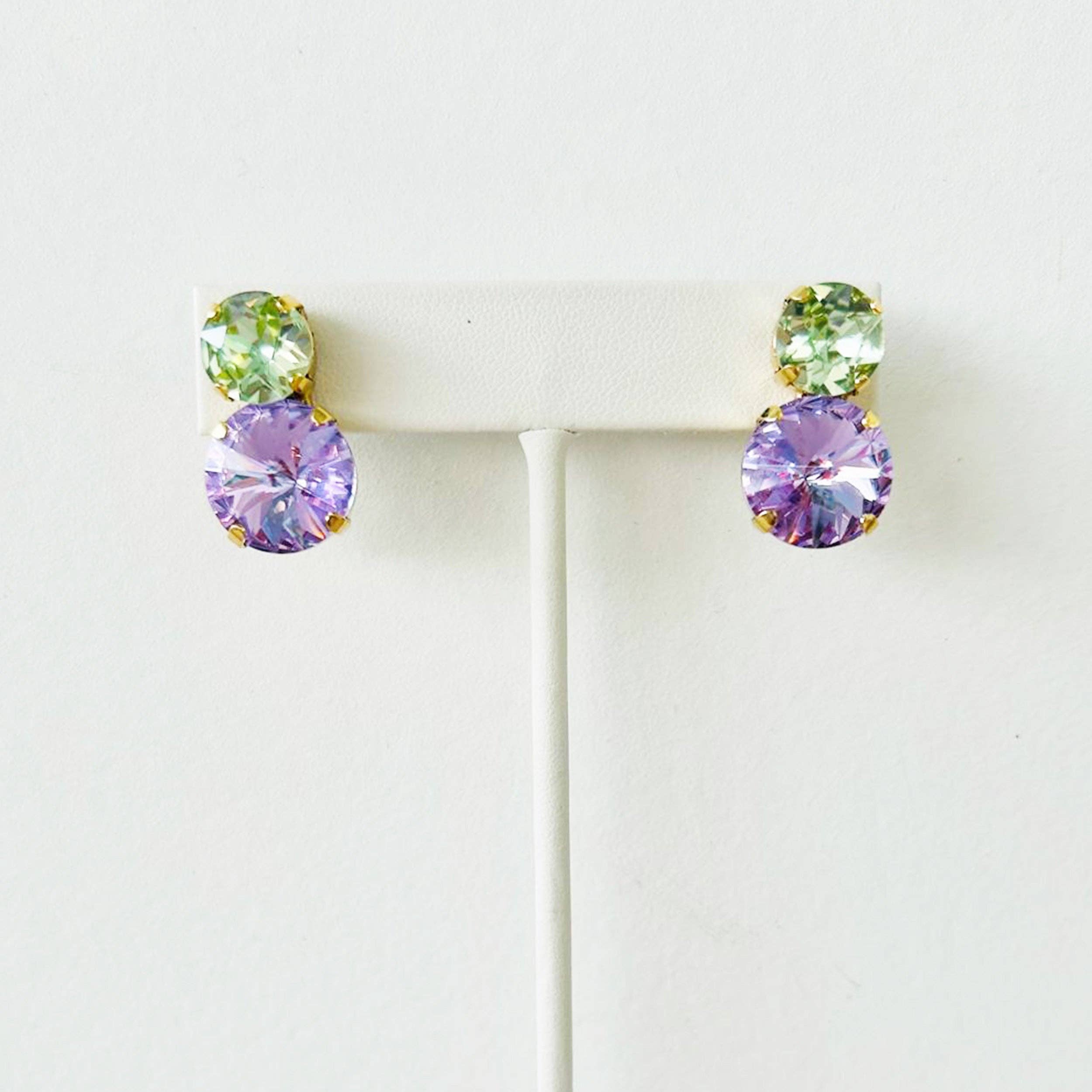 Tova violet crystal earrings with a brass base and sparkling statement design.