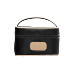 A black colored Jon Hart mini makeup case with natural leather trim and a leather patch for personalization.