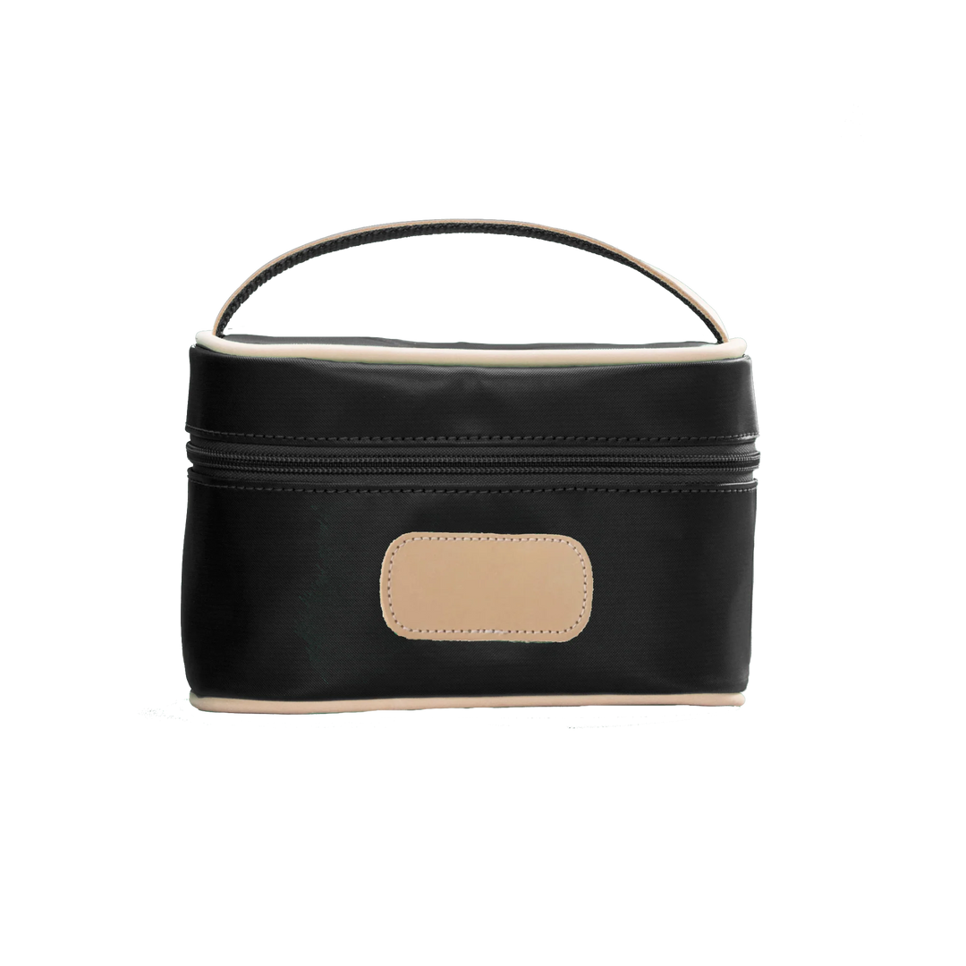 A black colored Jon Hart mini makeup case with natural leather trim and a leather patch for personalization.