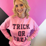 Halloween pullover with bold Trick Or Treat lettering and playful polka dot patch details.
