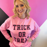 Halloween pullover with bold Trick Or Treat lettering and playful polka dot patch details.