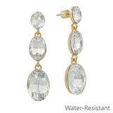 Gold tone triple oval crystal drop earrings with clear stones, water resistant, lead and cadmium safe.
