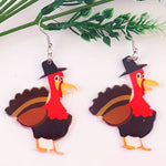 Turkey acrylic earrings with fall colors and laser-cut detailing, perfect for celebrating Thanksgiving and autumn.