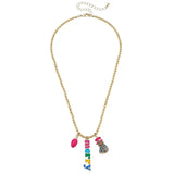 Gold beaded holiday necklace with Swarovski crystal snowman, pink Christmas light, and colorful “MERRY” word charm.