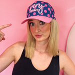 Navy blue Very Sweary embroidered cap with pink polka dots and snapback closure.