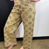 Vintage olive barrel jeans with oversized polka dots, smocked waist, and rolled cuffs.