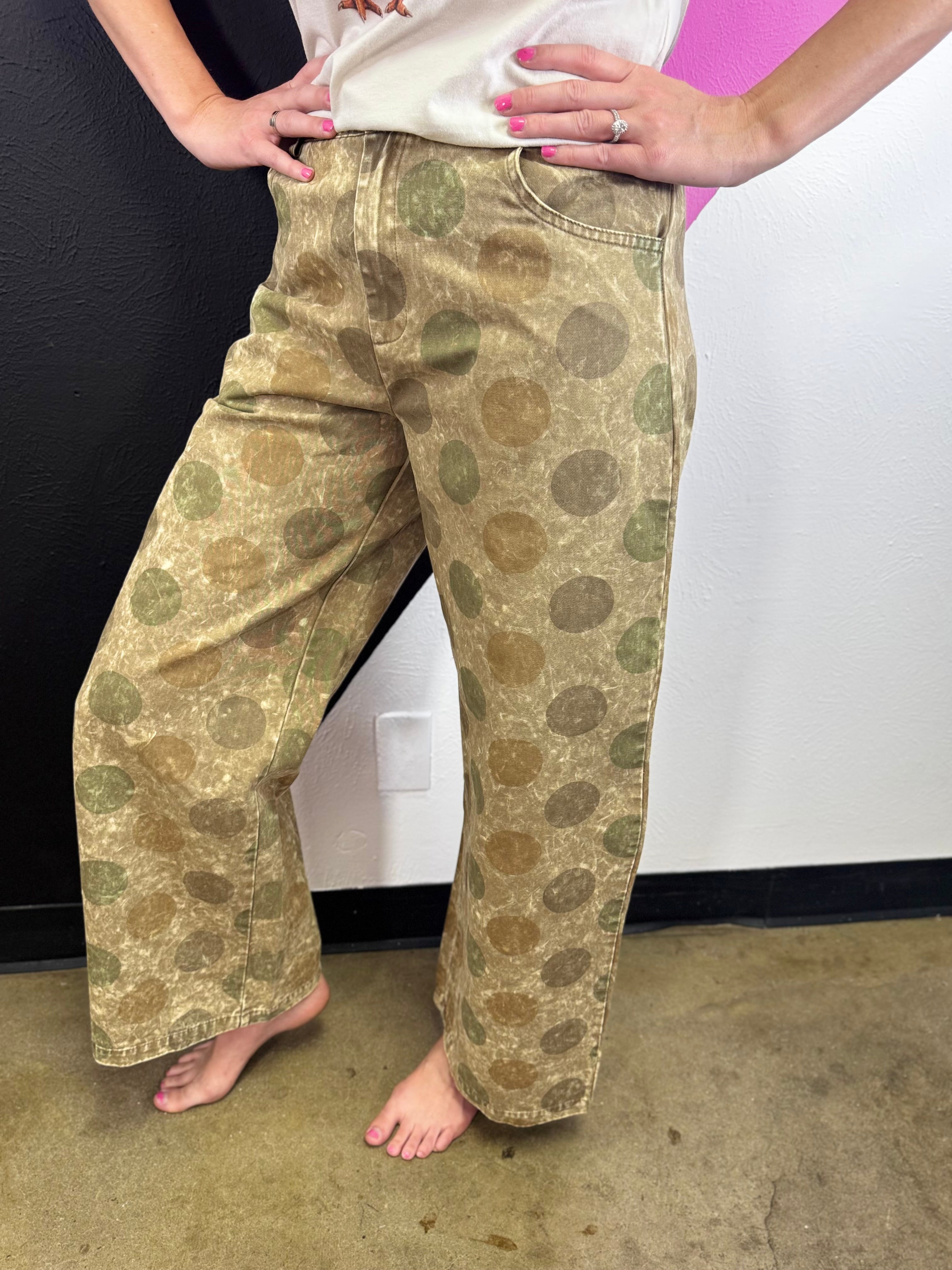 Vintage olive barrel jeans with oversized polka dots, smocked waist, and rolled cuffs.