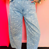 Light wash barrel jeans with white polka dots, high-rise fit, and wide leg.