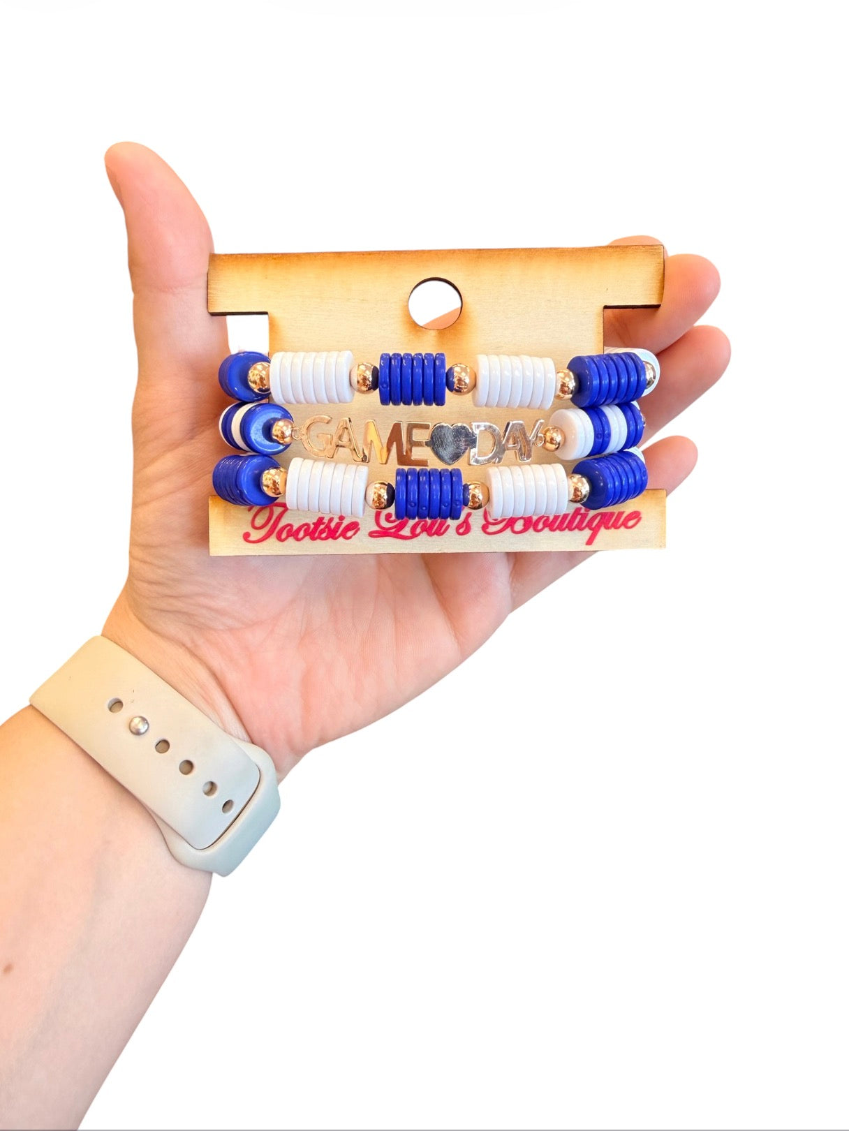 Blue and white Game Day bracelet stack with gold charm accents.