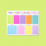 Weekly planner notepad with daily sections, to-do list, and gratitude area.