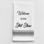 White tea towel with black trim and Welcome To The Shit Show quote.