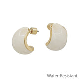 White acrylic gold .5 inch water resistant earrings with polished finish.