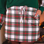 White plaid holiday skort with drawstring, pockets, and built-in shorts.