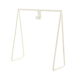 White freestanding art stand for displaying 6x6 prints and charms