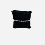 Gold filled bracelet with white Czech glass beads and stretch fit design.