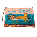 Rhinestone cheetah leather pouch with teal sofa graphic and pink striped reverse side.