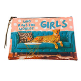 Rhinestone cheetah leather pouch with teal sofa graphic and pink striped reverse side.