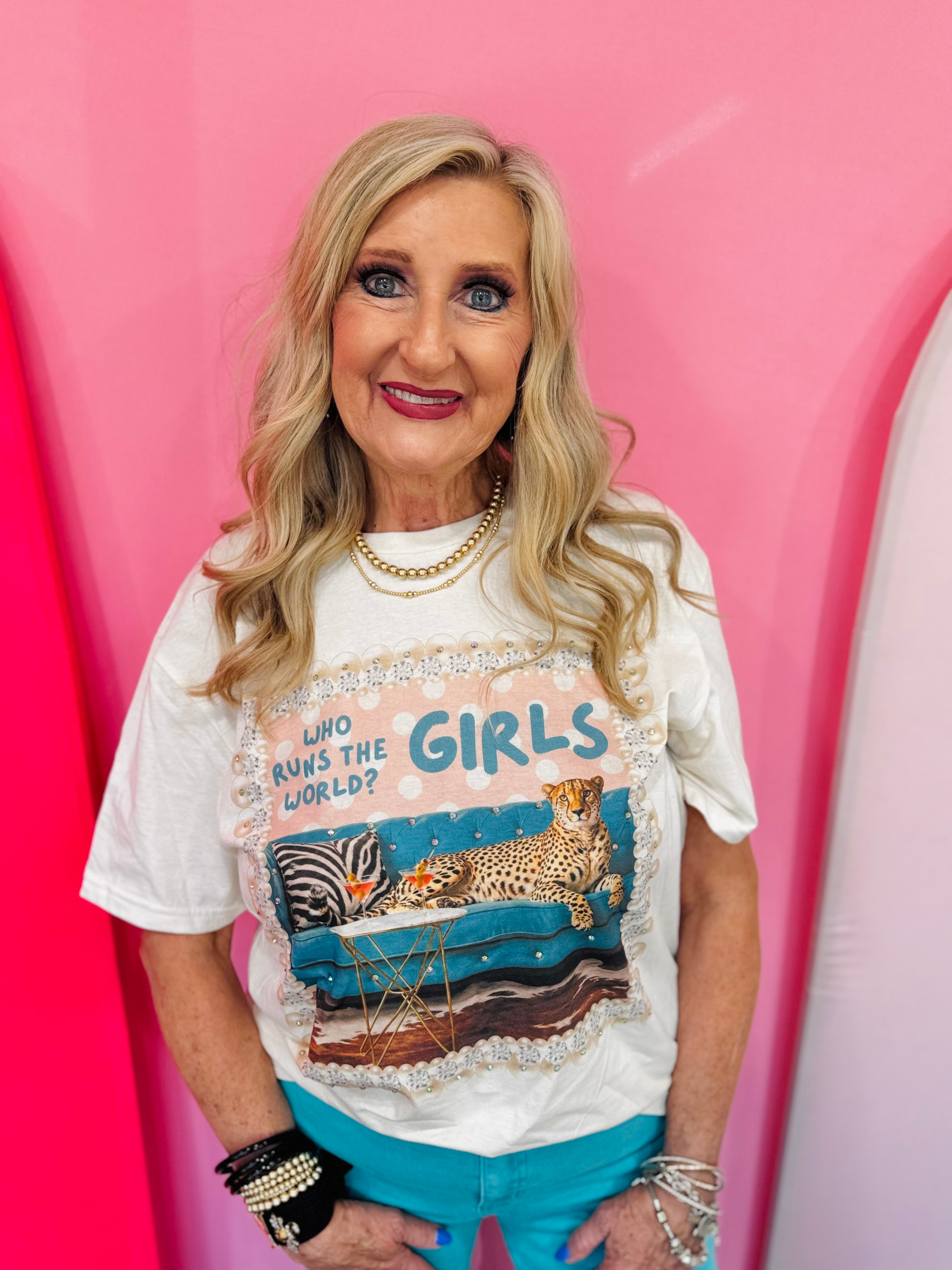 Women's rhinestone graphic tee with cheetah print and rhinestone embellishments