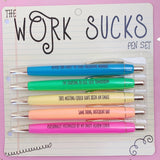 Work Sucks Pen Set with five black ink pens featuring sarcastic work-day sayings.