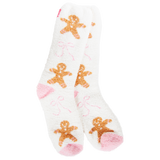 White holiday socks with gingerbread cookies, pink bows, and pink heels and toes.