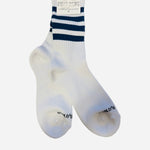 Solid navy ultra-soft crew socks with plush knit texture and comfortable stretch fit