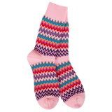 Pink cozy crew socks with multicolor zigzag pattern in purple blue green and red tones