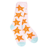 Pink cozy crew socks with starfish print and blue heel and toe accents