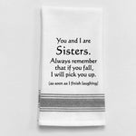 White tea towel with black trim and funny sisters quote.