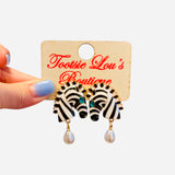 Zebra statement earrings with teal crystal eyes and pearl drop.