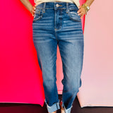 Cuffed skinny denim jeans with stretch fabric, high rise, and slim leg opening for a flattering fit.