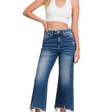 Mid-rise straight denim pants with raw hem in soft stretch fabric.