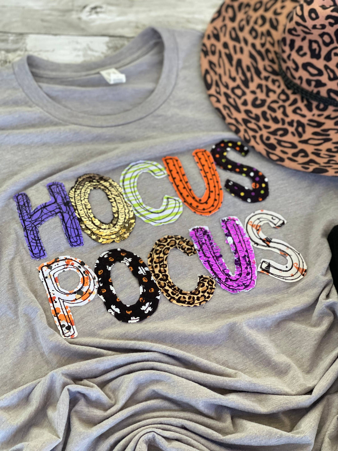 Athletic grey Bella + Canvas tee with Hocus Pocus appliqué design