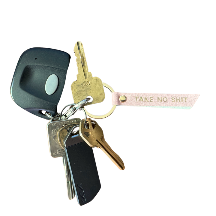 Keychain with keys and a pink strap 