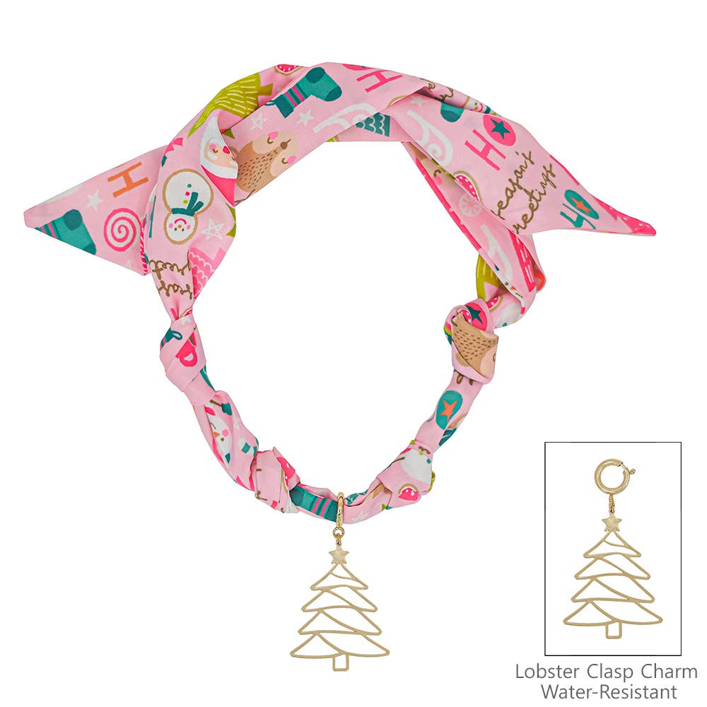 Pink silk scarf necklace with Santa print and removable gold Christmas tree charm.